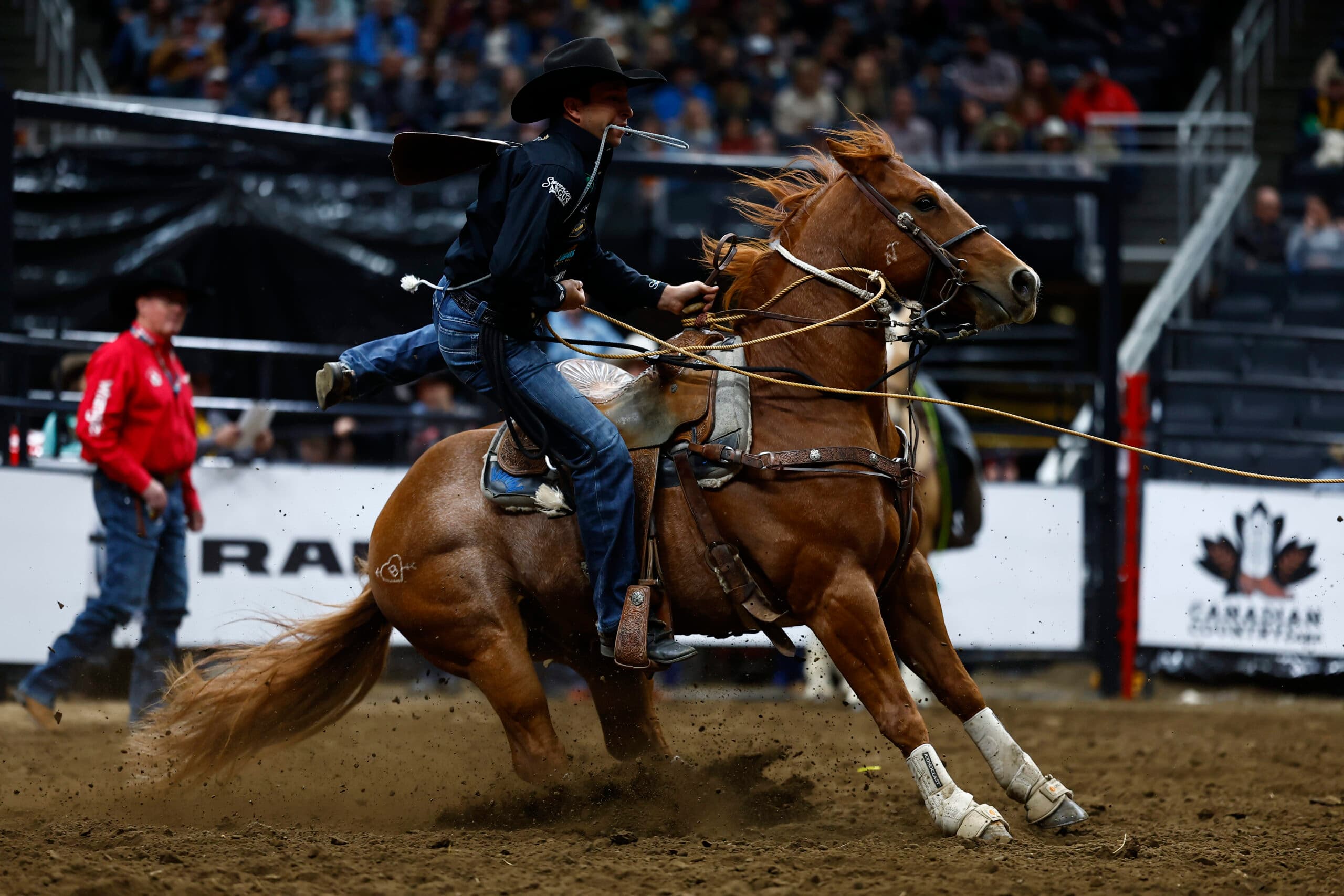 Haven Meged roping for his second Canadian Championship title in the calf roping in 2024.