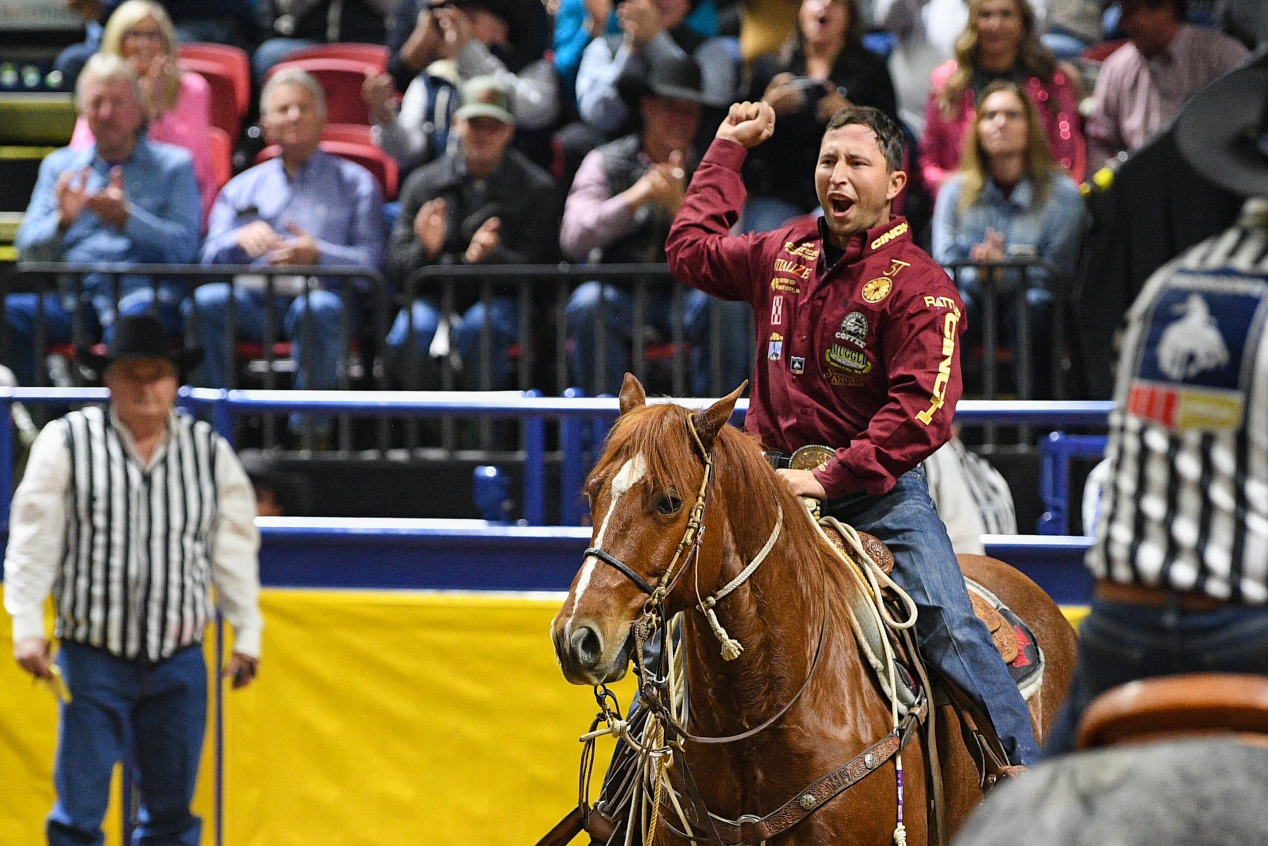 Haven Meged cheers after securing his 6.4-second time at the 2023 NFR.