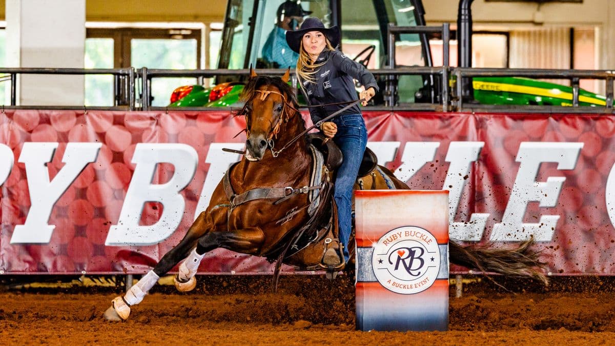 Laura Mote and Watch The Lane power out of a barrel turn