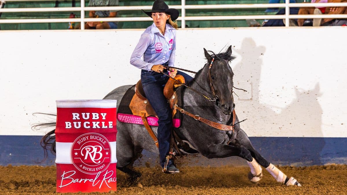 Ceri Ward turns a barrel on her pretty roan mare