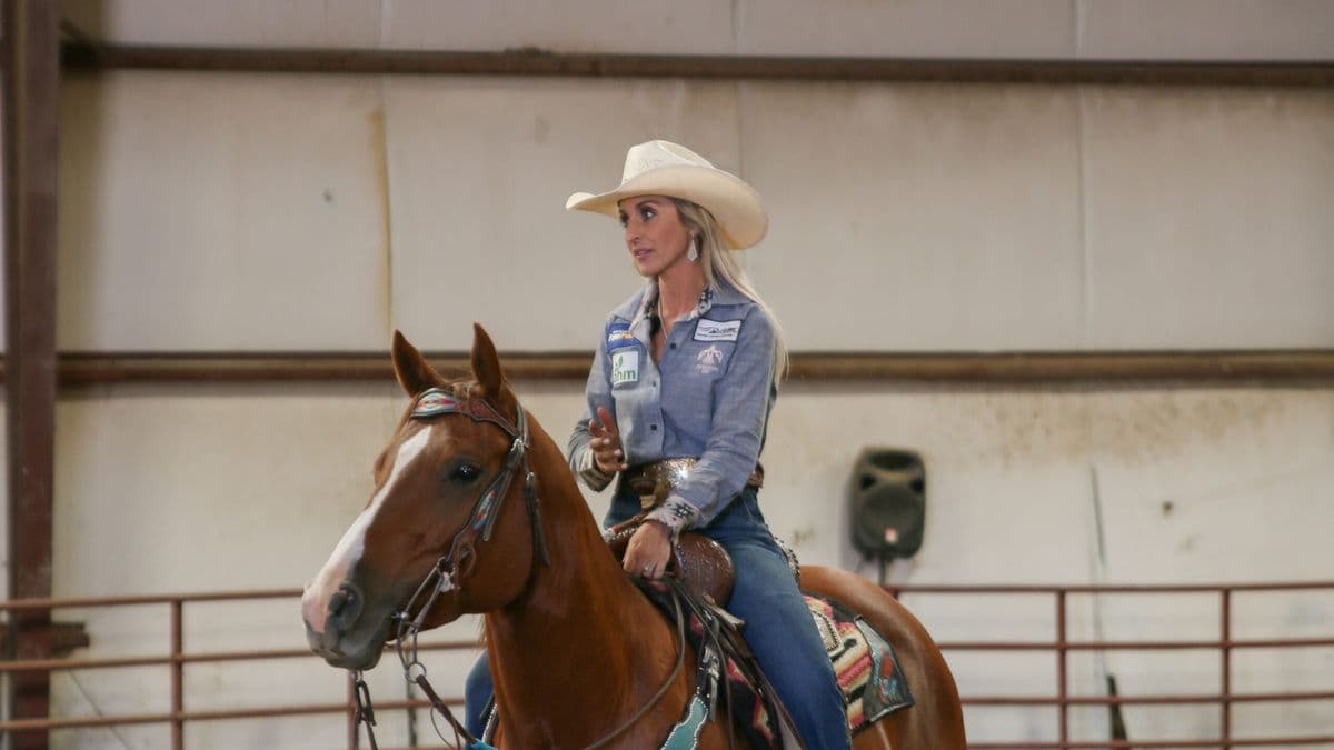 Amy sitting on a horse