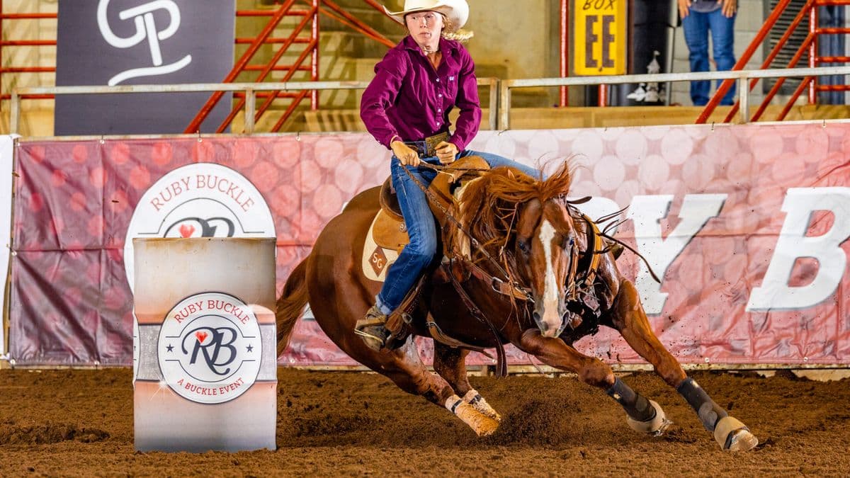 Sydney Graham barrel races on Dupont First