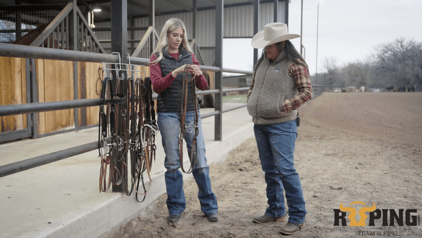 Sarah Angelone and Danielle Lowman stand next to a rack of breakaway bits