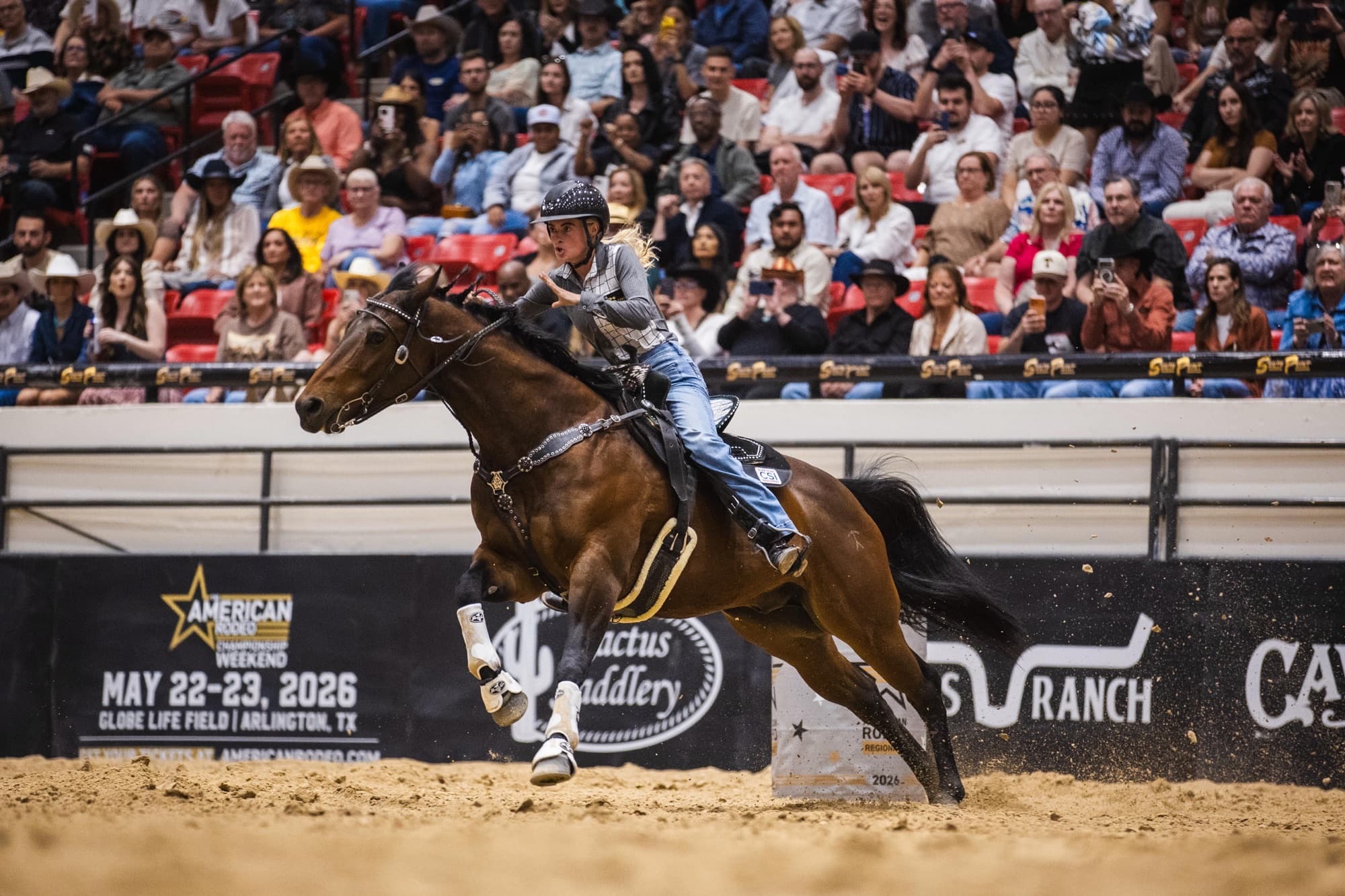 Hailey Krahenbuhl and Saaul good turn a barrel