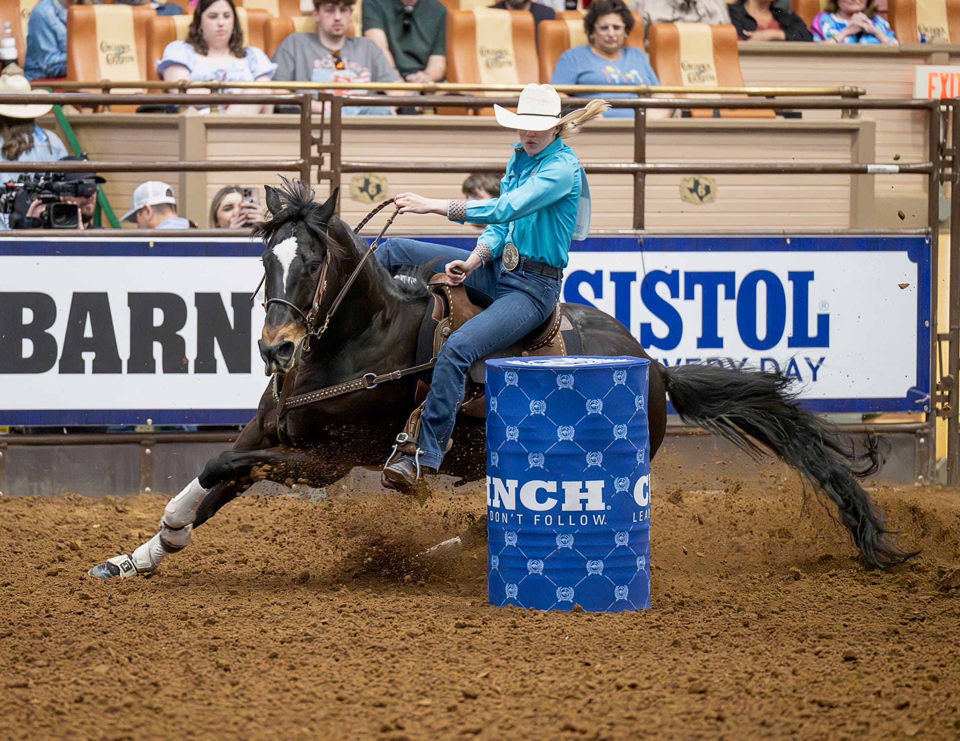 Morgan Bagnell turns a barrel at Resistol Rookie Roundup