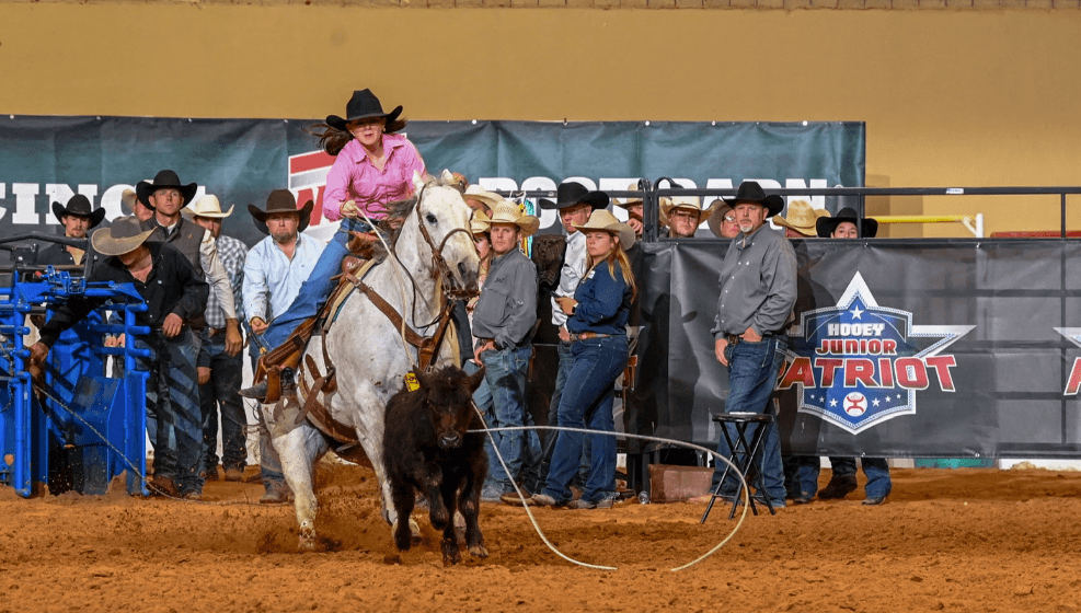 Emmry Edwards trots out of the arena on her beloved "Gray" following a successful run at the 2025 Patriot in Fort Worth.