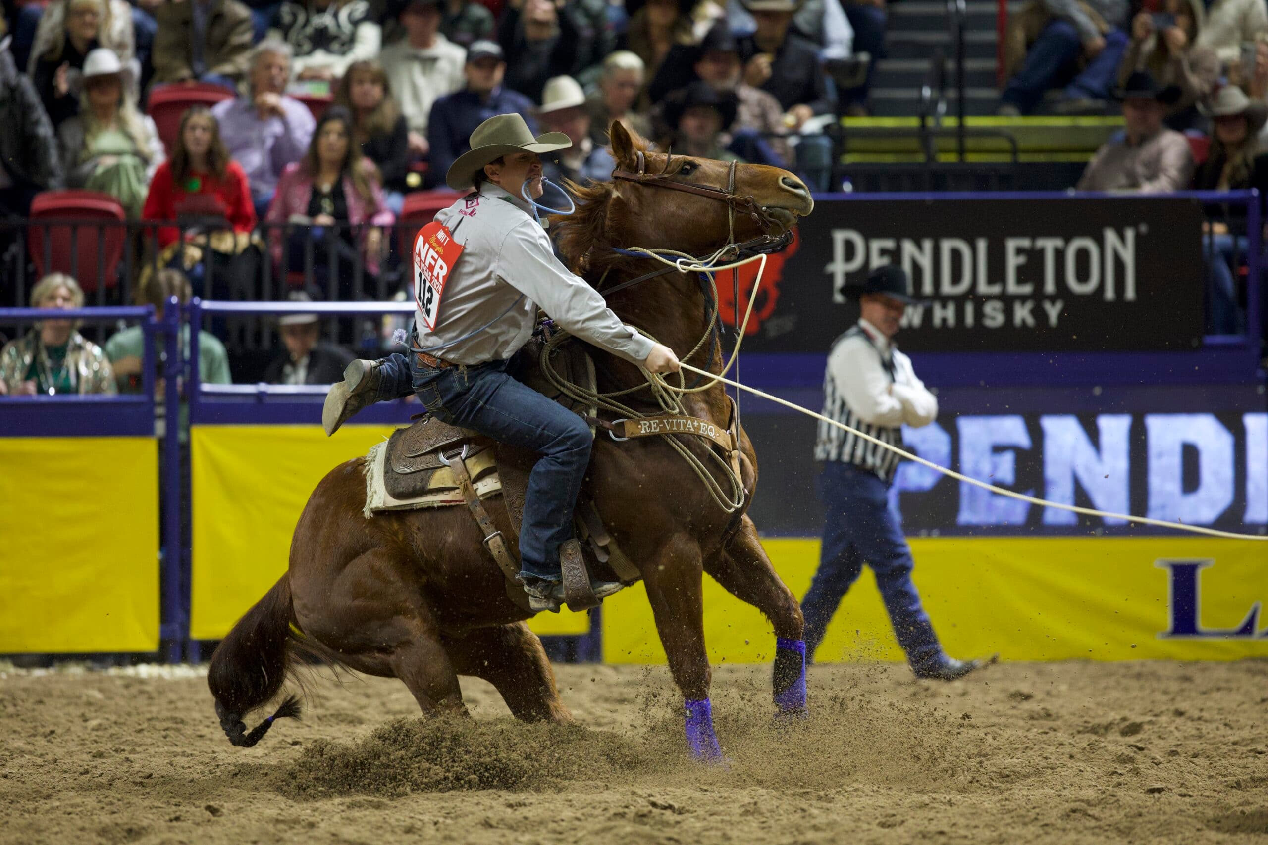 Quade Hiatt aboard JJ Shimmer Cat, aka "Big Red" in Round 1 of the 2024 NFR.