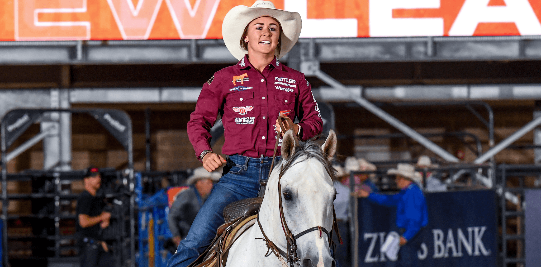 Rickie Engesser smiles as she rides out of the arena on "Copper" at the Days of 47 Rodeo in Salt Lake City.