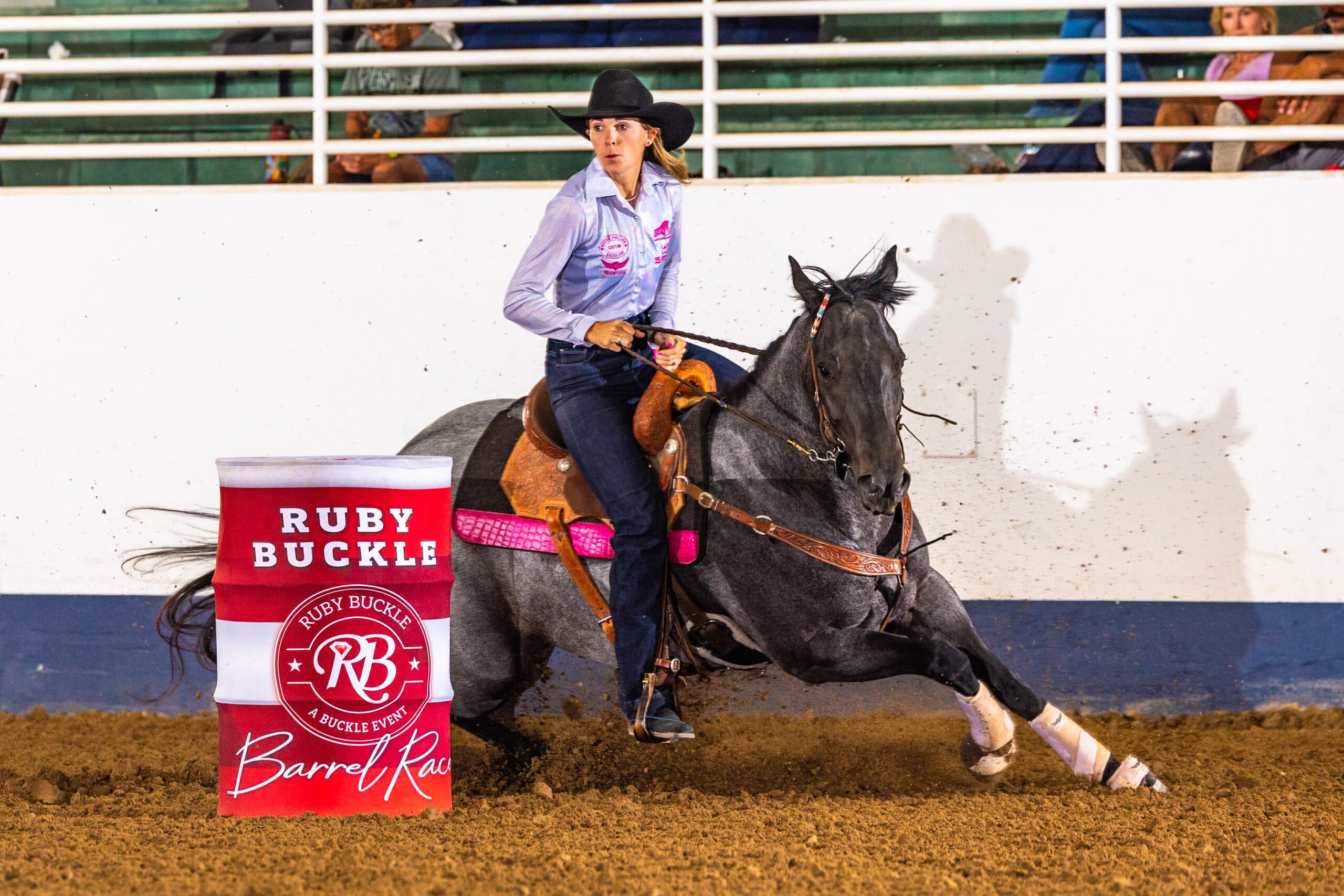 Ceri Ward turns a barrel on her pretty roan mare