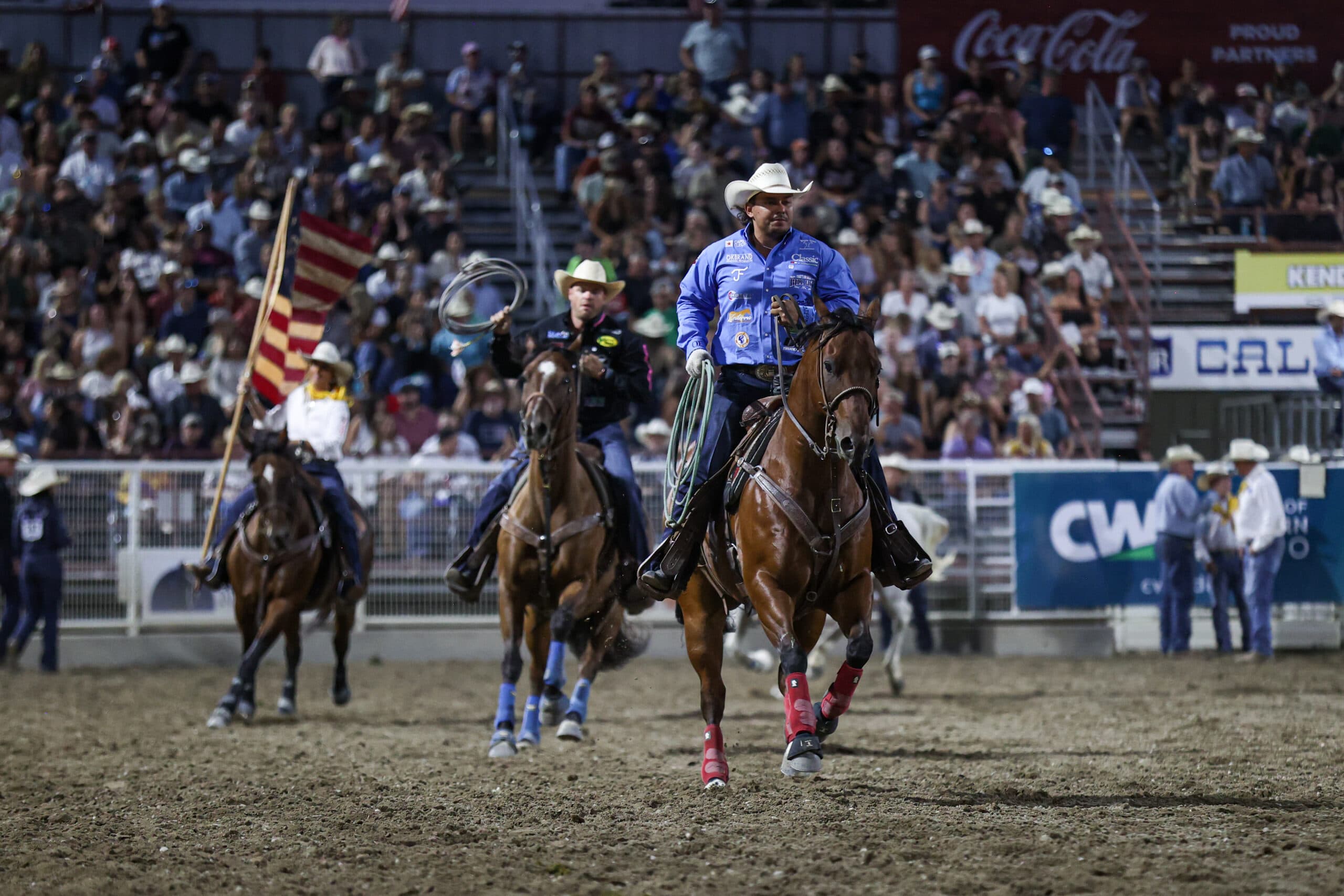 Jonathan Torres riding Scooter out of the arena after a win