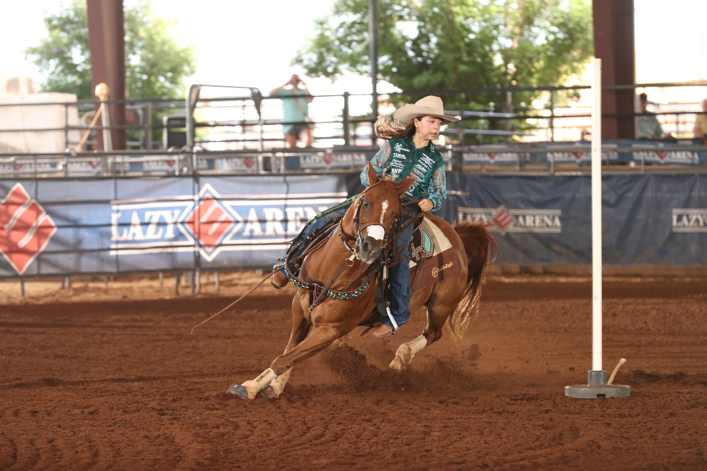 Dusky Lynn Hall turns a pole
