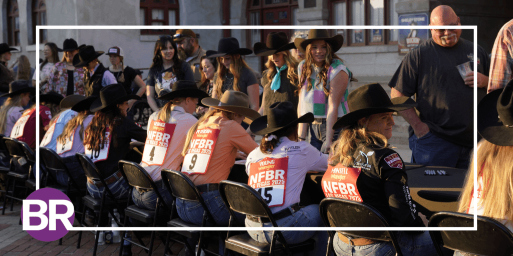 Breakaway ropers in cowboy hats and numbered NFBR Las Vegas 2025 back numbers seated in rows at an outdoor contestant event